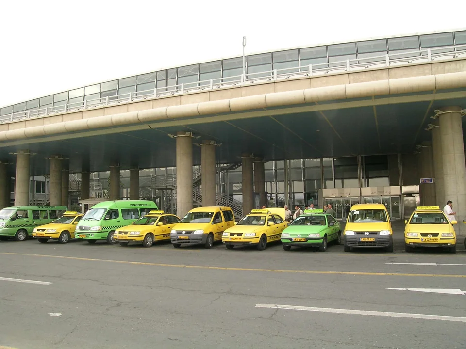 Taxi Bisim Tehran vehicles outside an airport terminal in the company photo archive